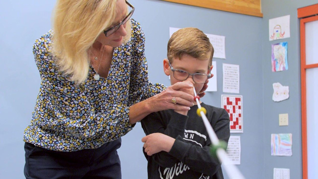 boy taking eye exams at Cathedral Eye Care