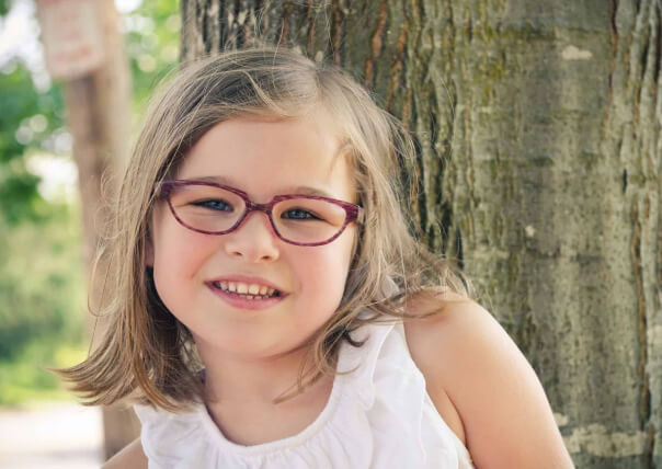 girl wearing eyeglasses at Alberta Eye Care