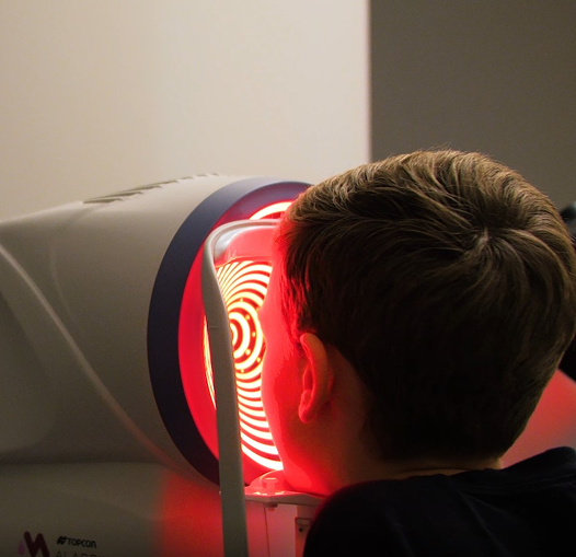 young girl wearing eyeglasses at Alberta Eye Care